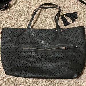 Black laser cut pattern tote